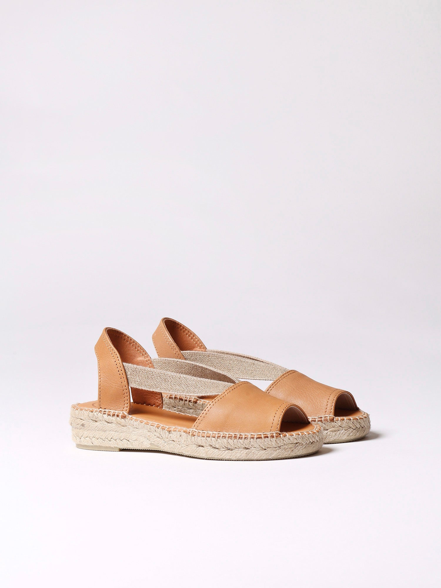 Flat leather sandal with elastics - ETNA
